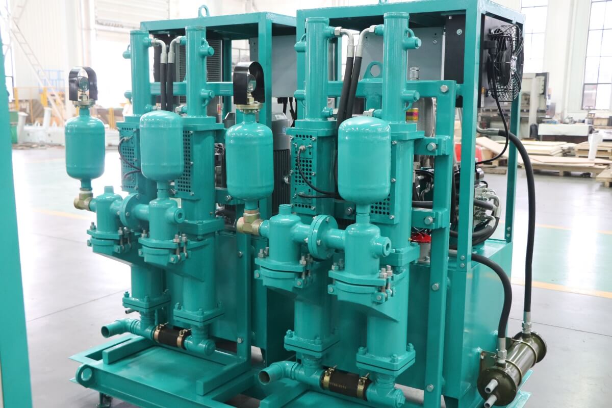 Double plunger grout pump