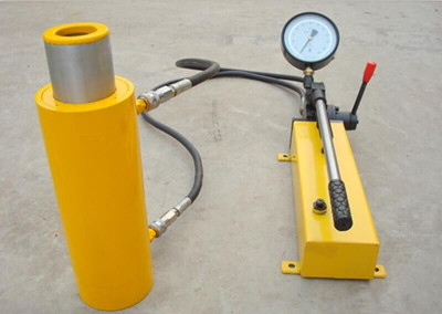 double acting hole jack with hand pump