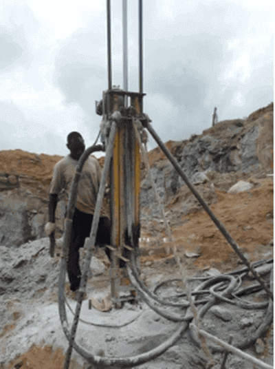 DTH drilling machine for rock