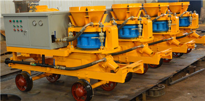 Wet shotcrete machine with rail wheels