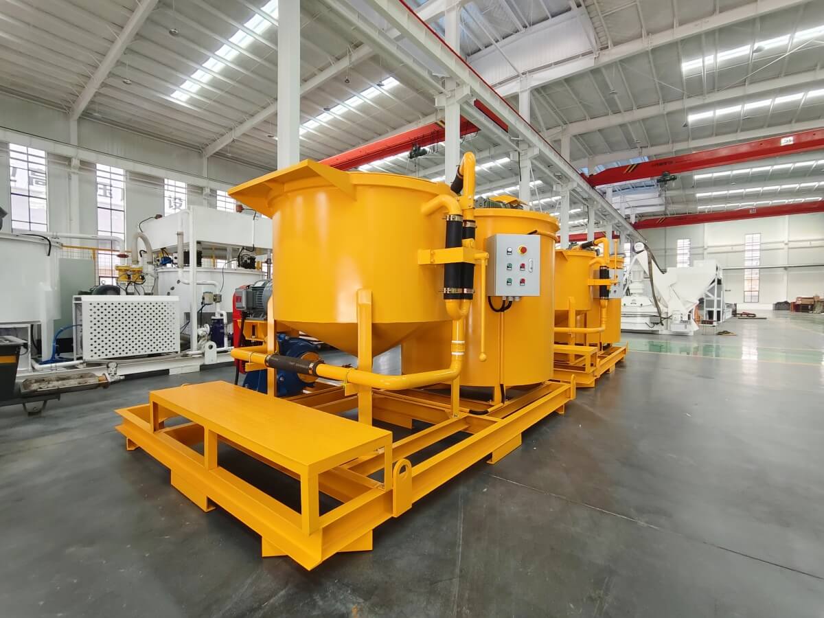 Grout mixing plant for filling the annular void of the tunnel