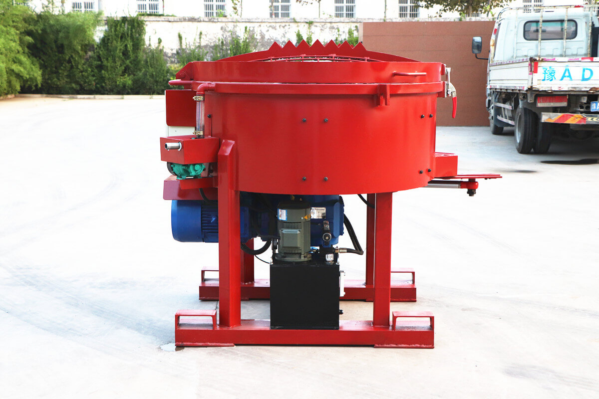 refractory pan mixer with hydraulic discharge door