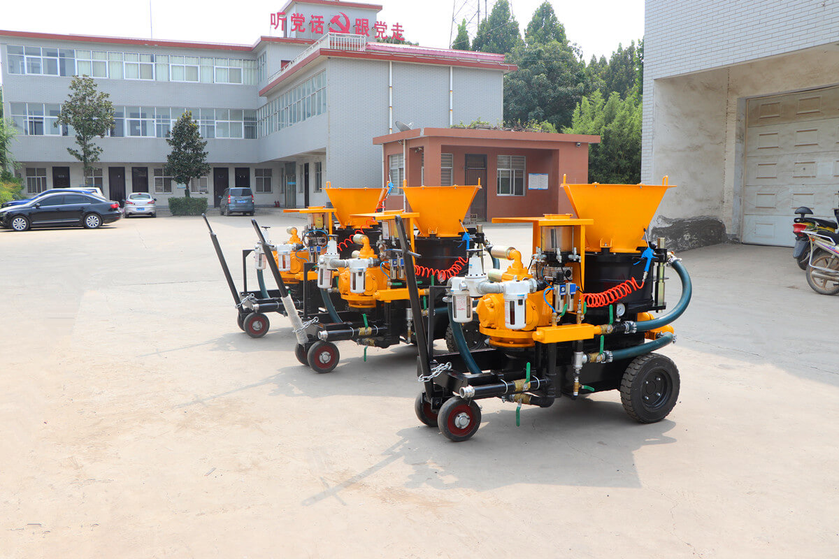 Shotcrete machine for dry and wet spraying