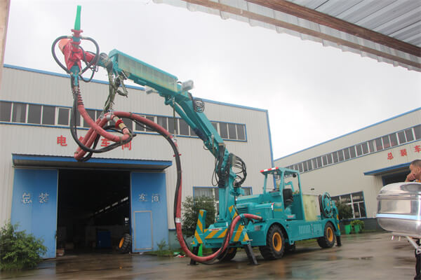 concrete spraying machine with arm system