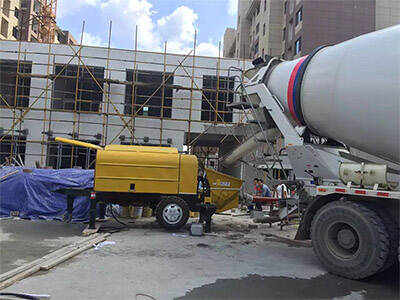 Construction site with concrete pump