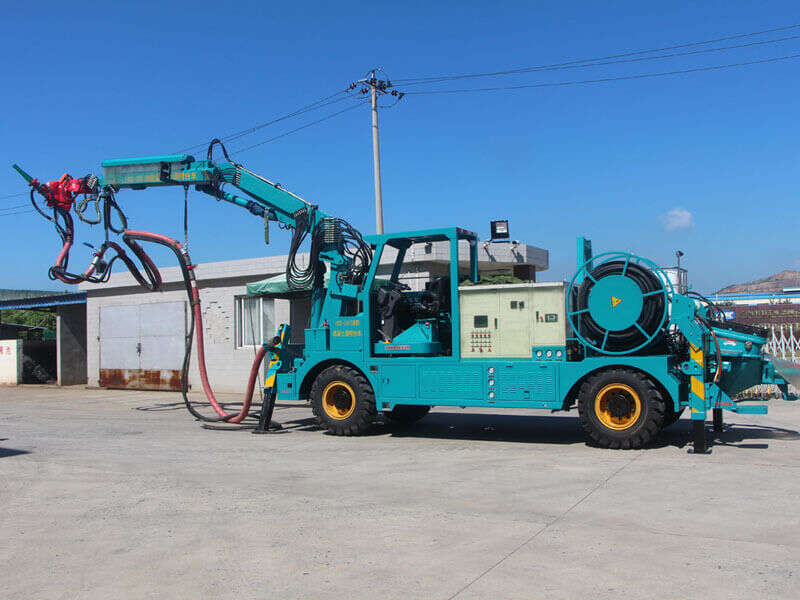 shotcrete machine with spray arm